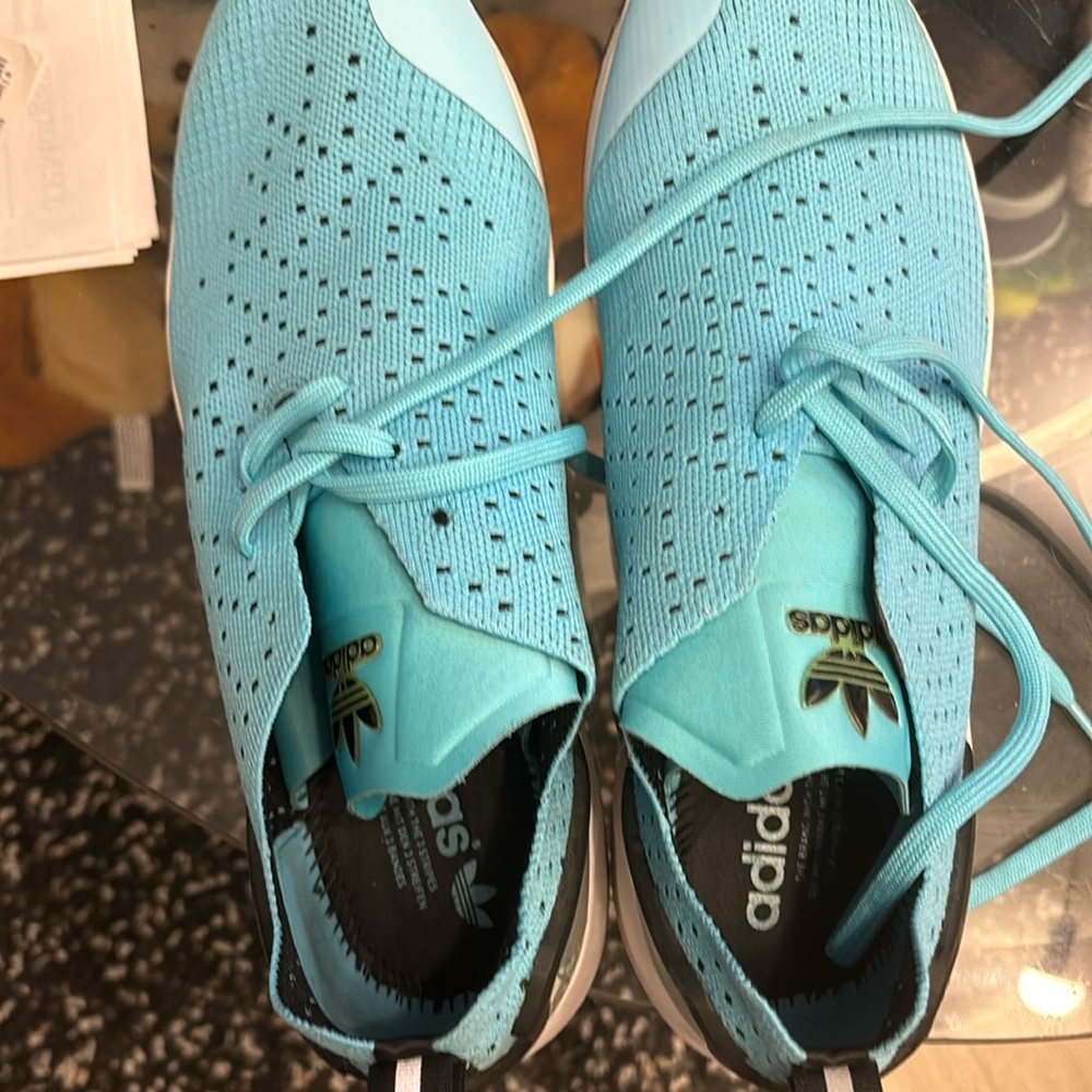 Brand new  Adidas size 9.5 sneaker never worn